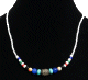 Collie ethnique artisanal imitation perles multicolores agrementees de perles blanches et d'un pendentif argente grave
